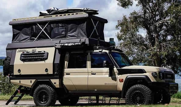 Wake up above the African bush on a self-drive rooftop tent safari in Tanzania. Reliable Land Cruisers, full camping gear, departing from Dar es Salaam.